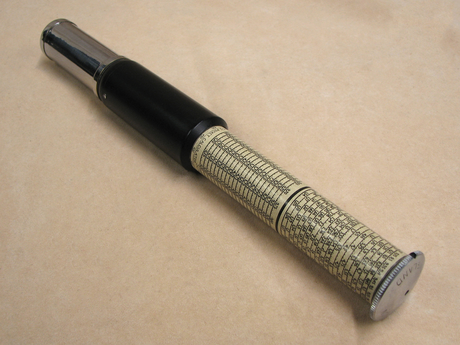 Early 1950s Otis King Model L type B cylindrical slide rule and calculator